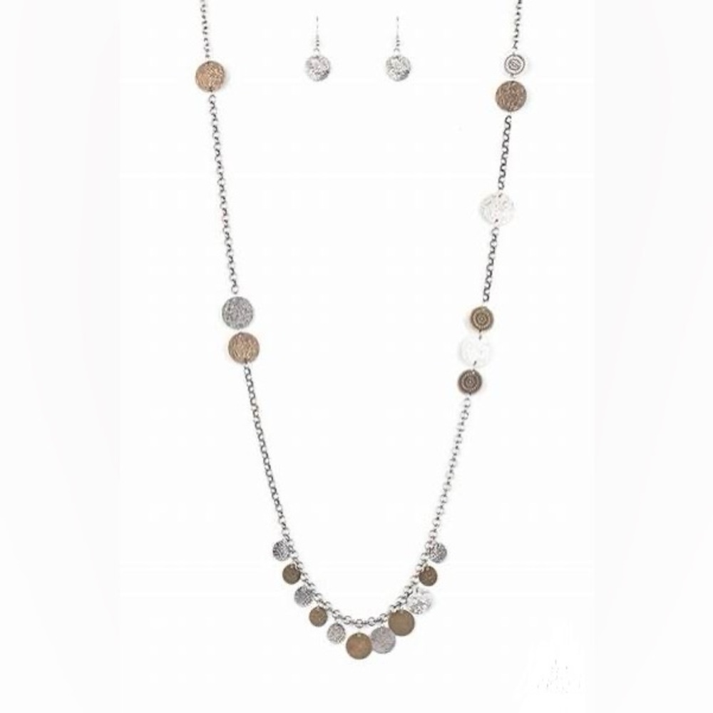 *Long silver and copper necklace.